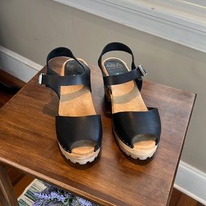 Mia -Greta clog with peep toe front.